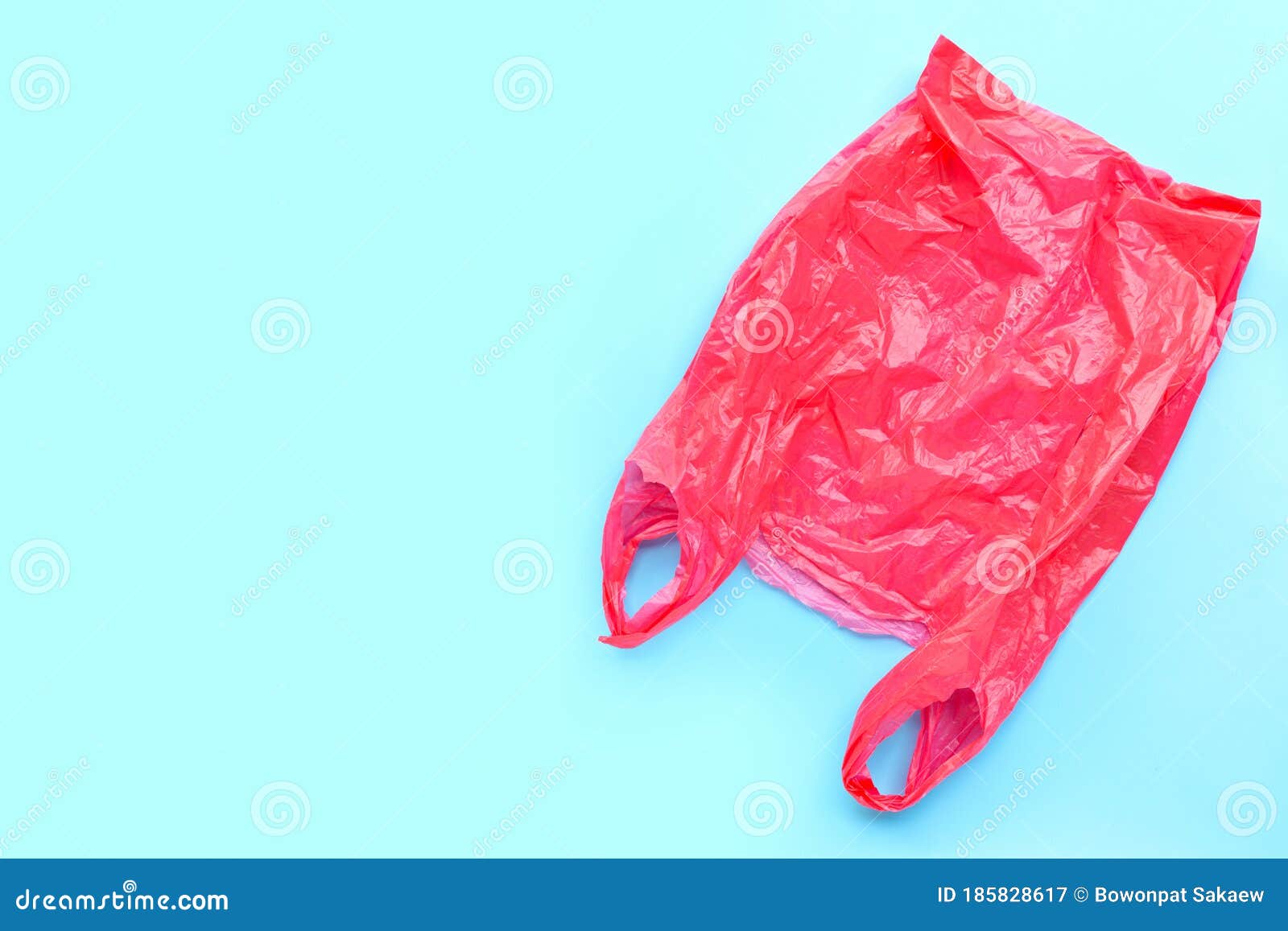 Red Plastic Bag on Blue Background Stock Image - Image of ecology