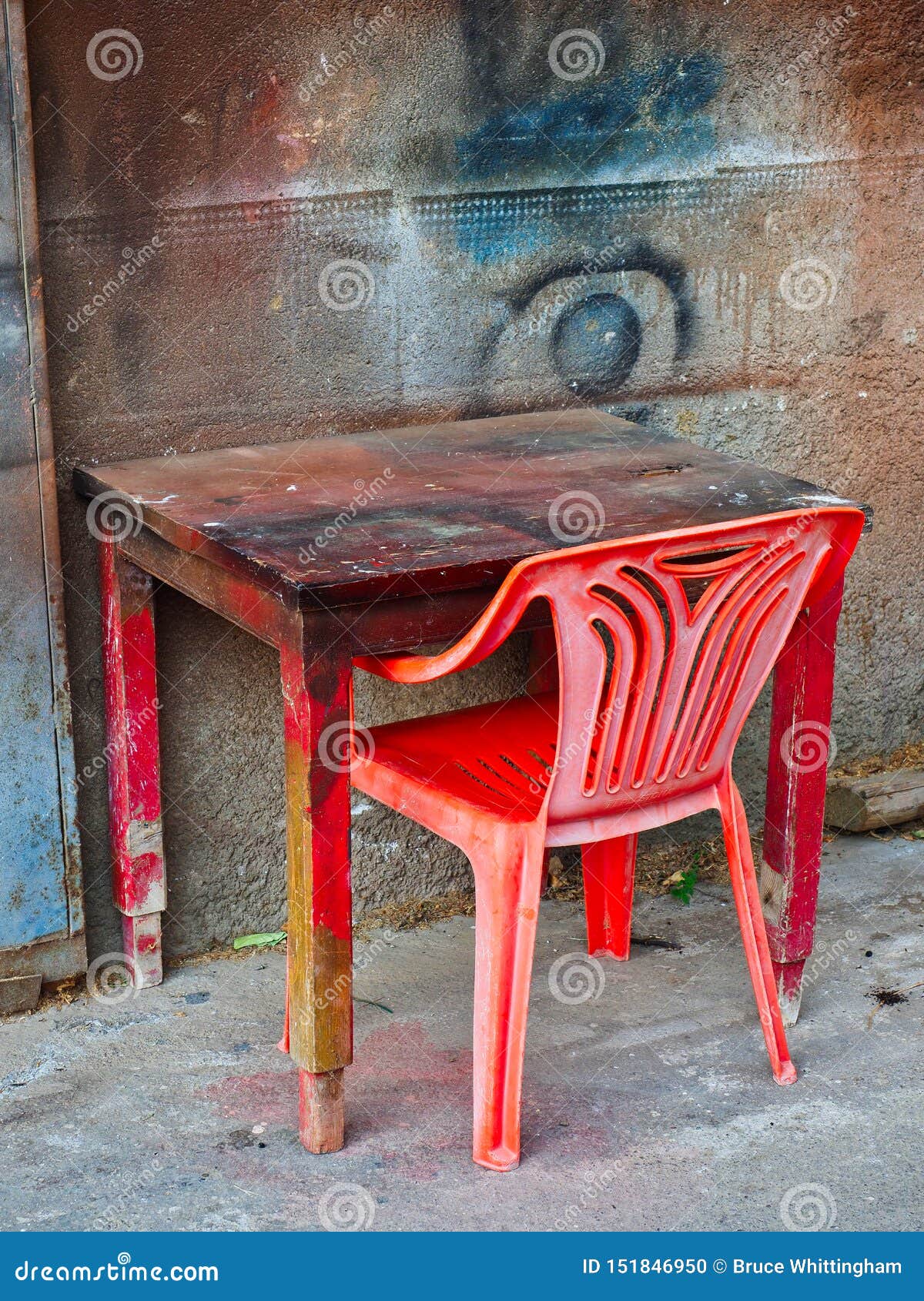 A Red Plastic Chair At Table Stock Photo Image