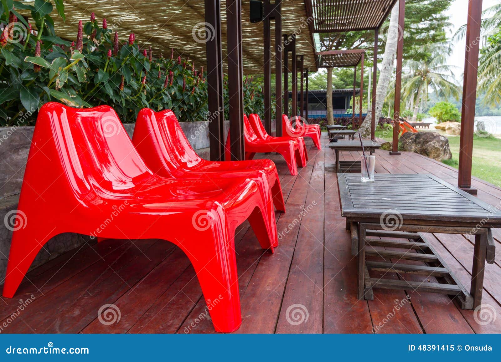 Red Plastic Chairs at Terrace Stock Image Image of relax