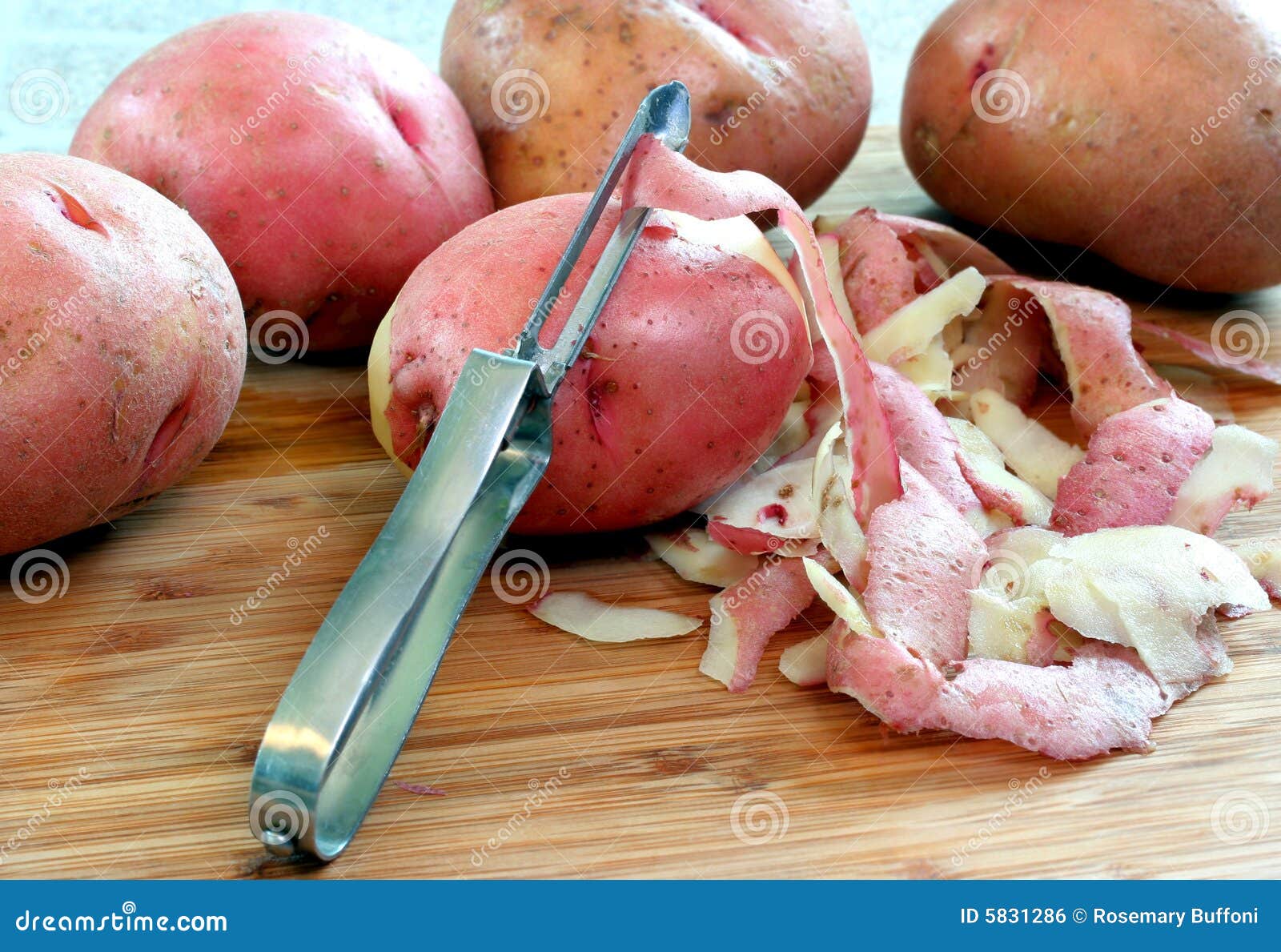 Red Potatoes Being Peeled stock photo. Image of prepare 5831286