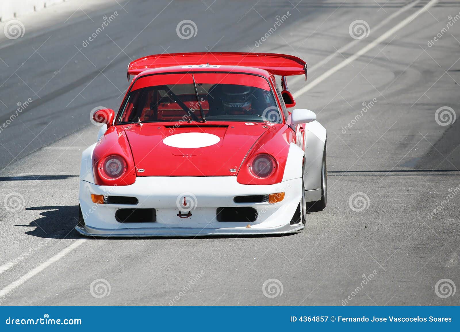 Premium Photo  Race car racing on a track with speeding motion