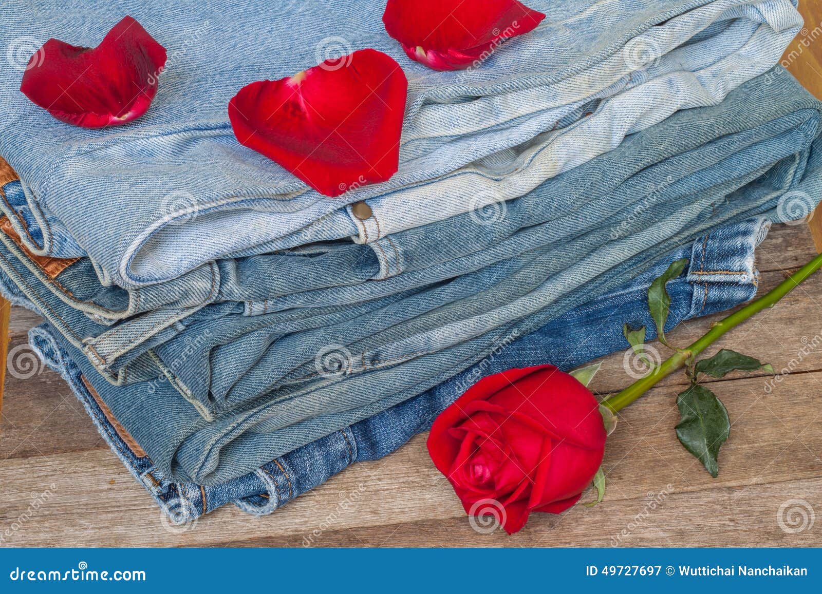 Red rose and jeans stock image. Image of romance, floral 49727697