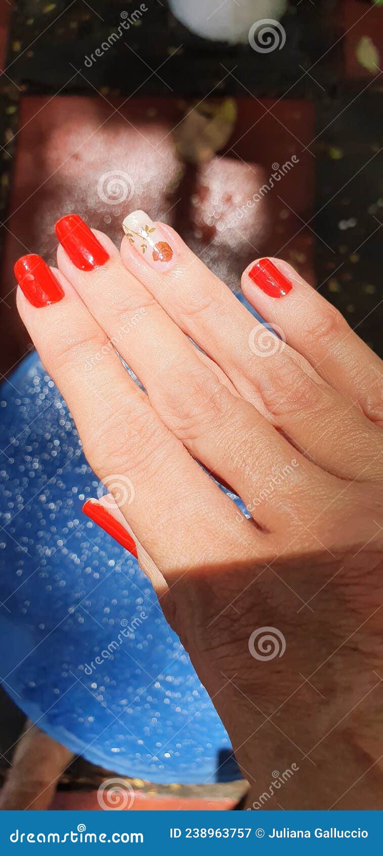 Beautiful Female Hand With Purple Nail Design And Red Rose. Stock Photo,  Picture and Royalty Free Image. Image 61185879.