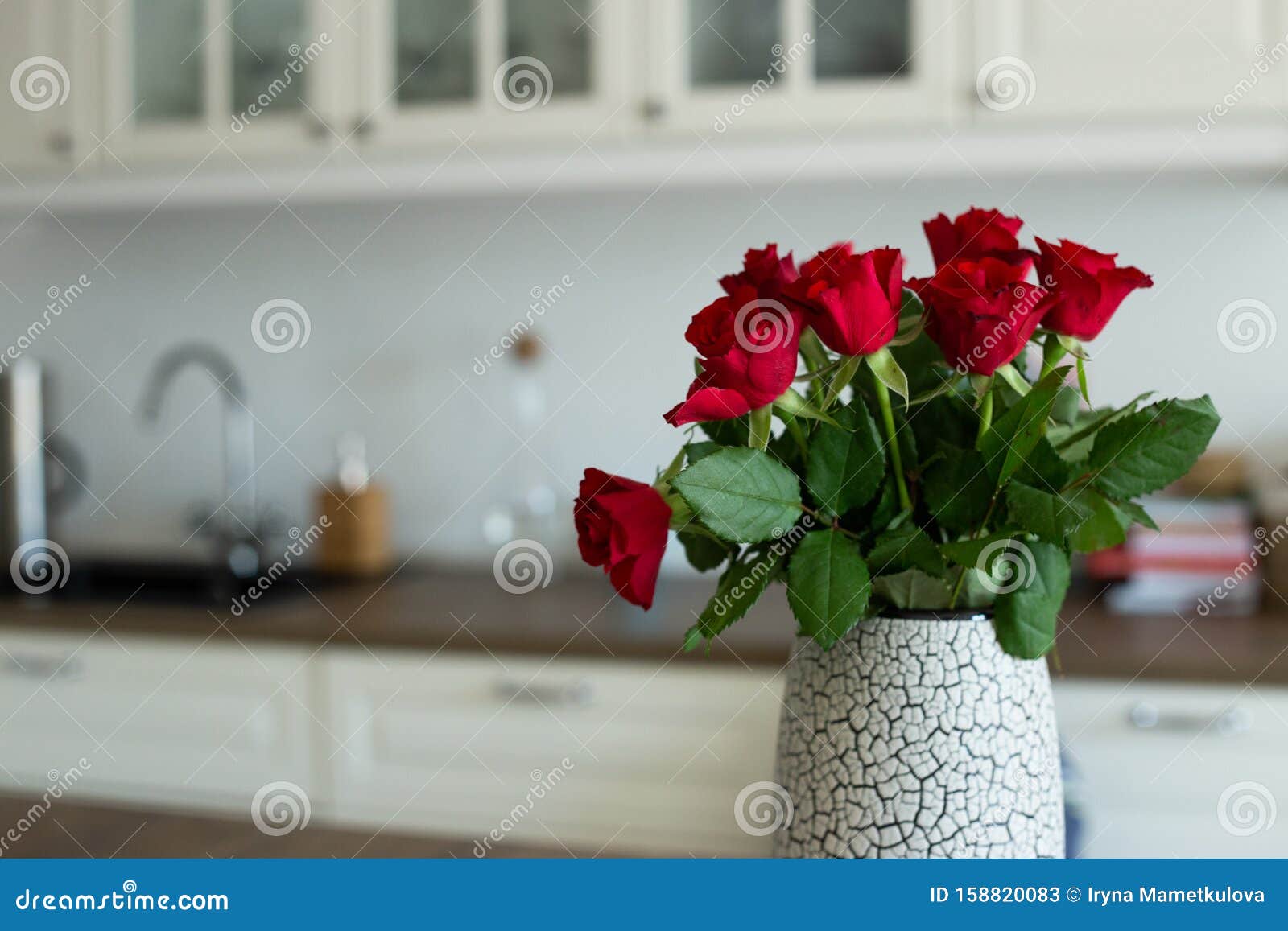 red roses kitchen table