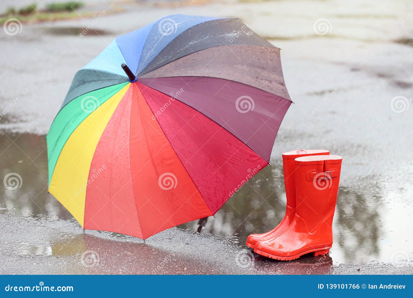 Rubber boots with umbrella stock photo. Image of protective 139101766