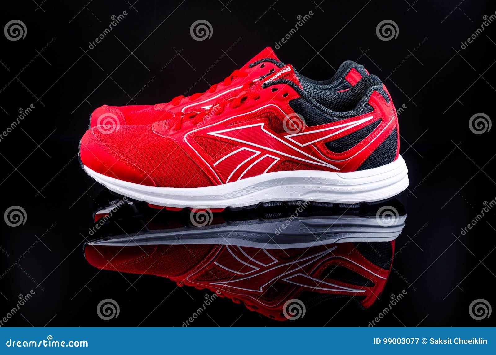 Red running shoes editorial photography 