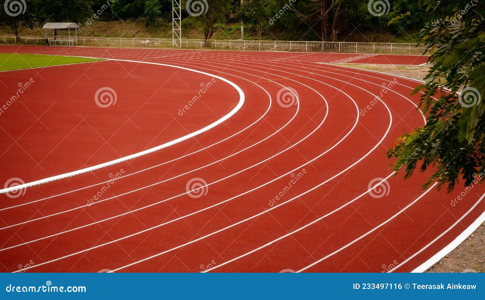 Red Running Track in Public Stadium. Sport Backgrounds Stock Photo