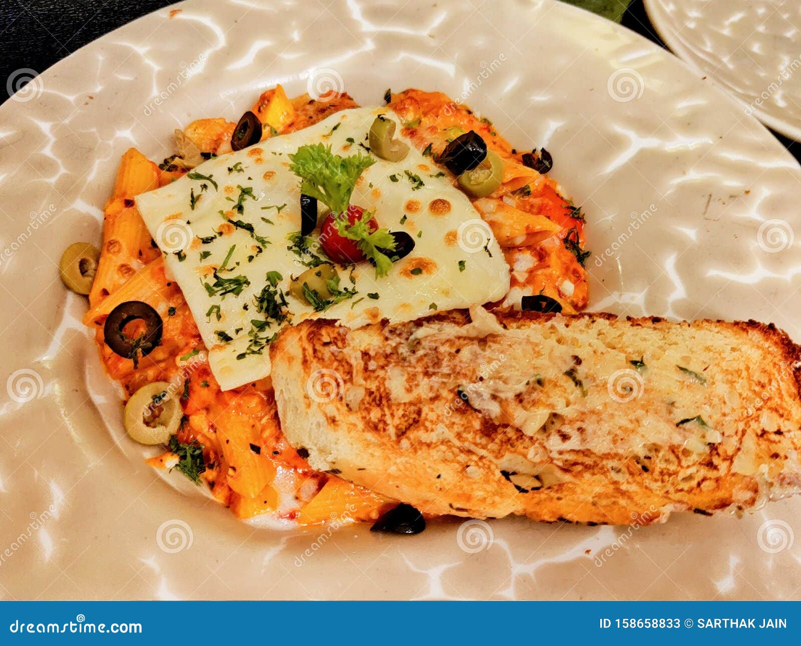 Red Sauce Pasta with Extra Cheese and Garlic Bread Stock Image Image