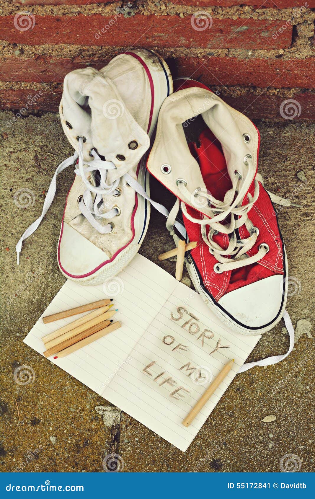 Red Sneakers And Pastels Leaning Against A Brick Wall ...