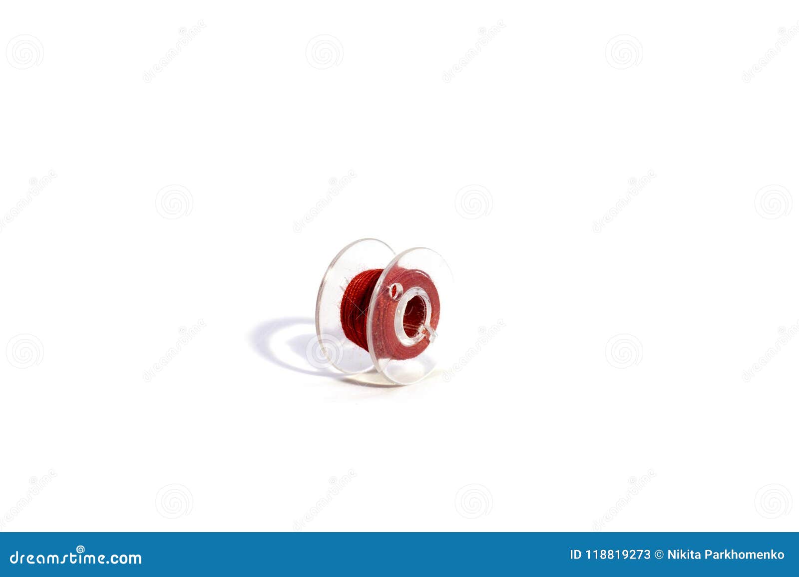 red spool of thread