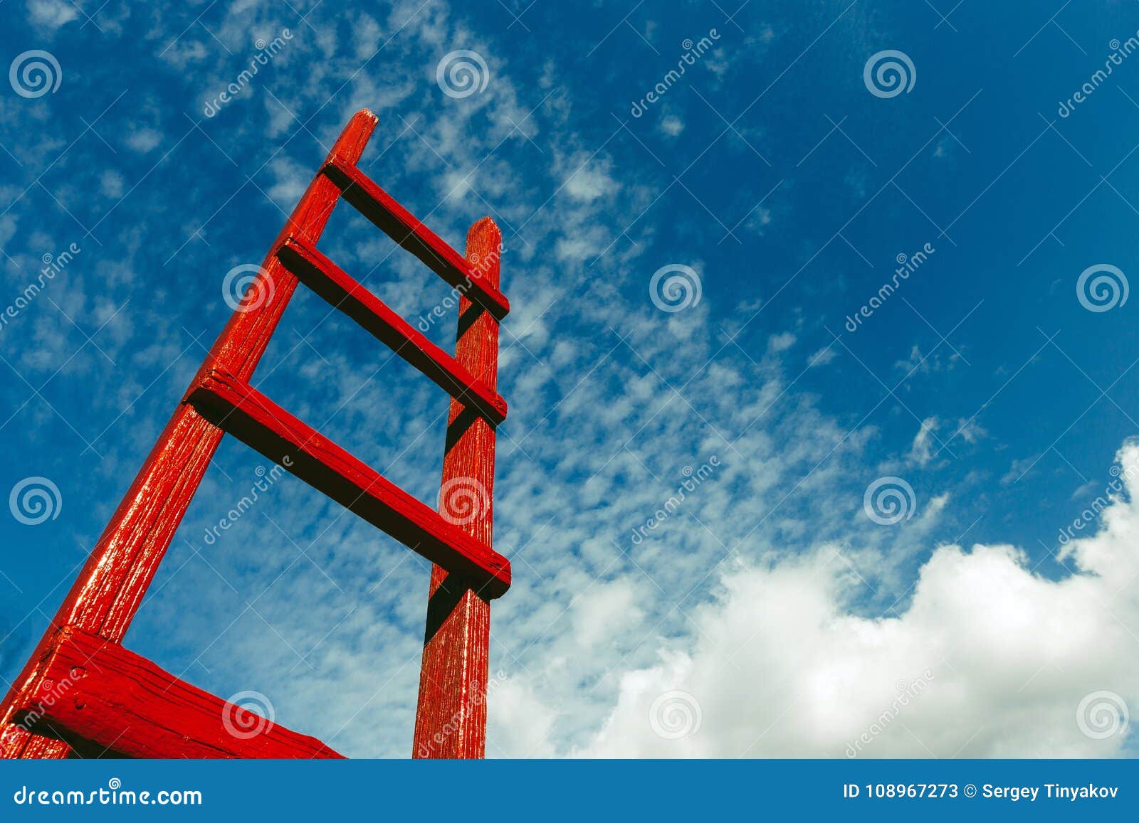 red wooden staircase against the blue sky. development motivation business career heaven growth concept