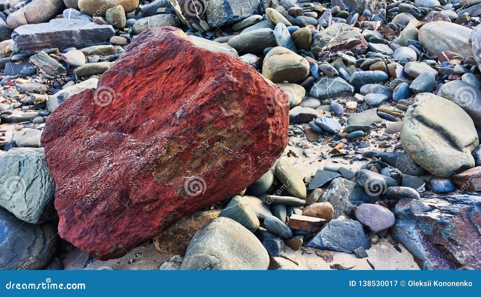 Red Stone, Unusual Stone, Be Bright, Stand Out from the Crowd Stock Image -  Image of unusual, stand: 138530017