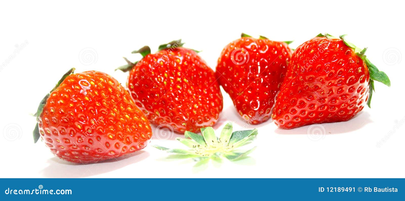 Red strawberries. Four red fresh and sweet strawberries isolated on white.