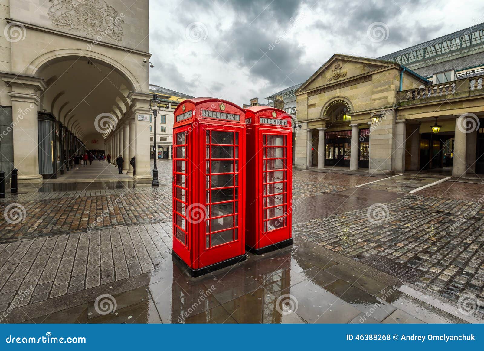 red telephone box at covent garden market on rainy day