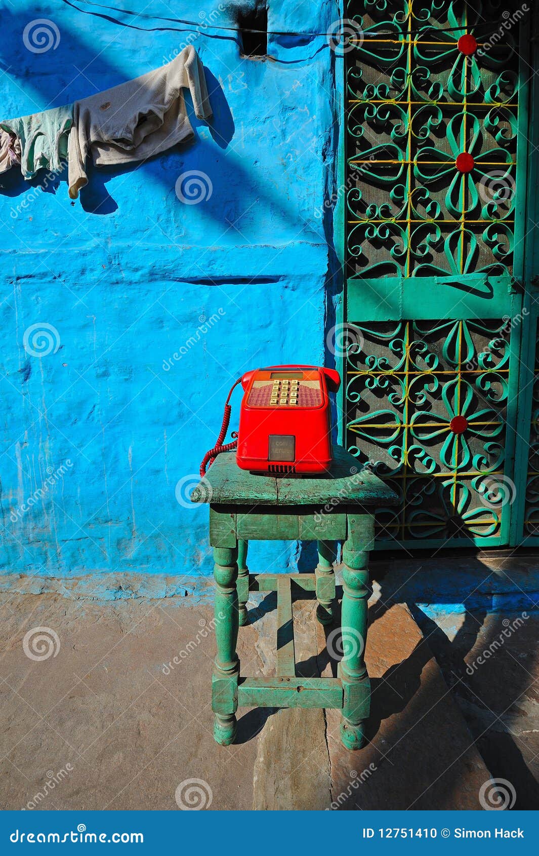 Red telephone in rajasthan stock photo. Image of jodphur 12751410