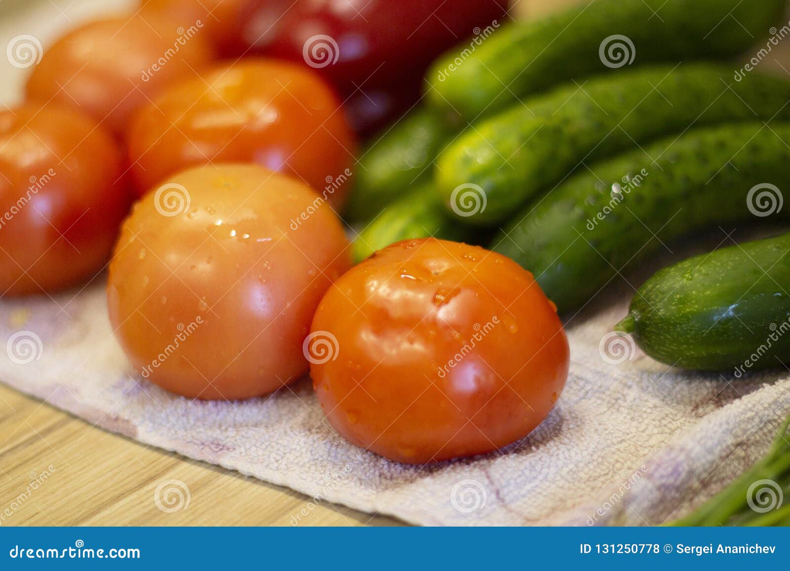 red tomatoes and cucumbers lie on the table close-up6