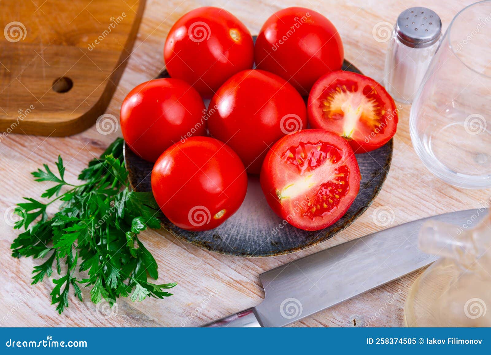 Red Tomatoes on Kitchen Table Stock Image Image of table, closeup