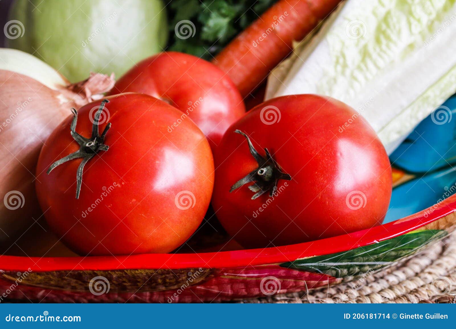 Red Tomatoes, Onion, Chayote, Carrots and Lettuce in a Tray Stock Photo