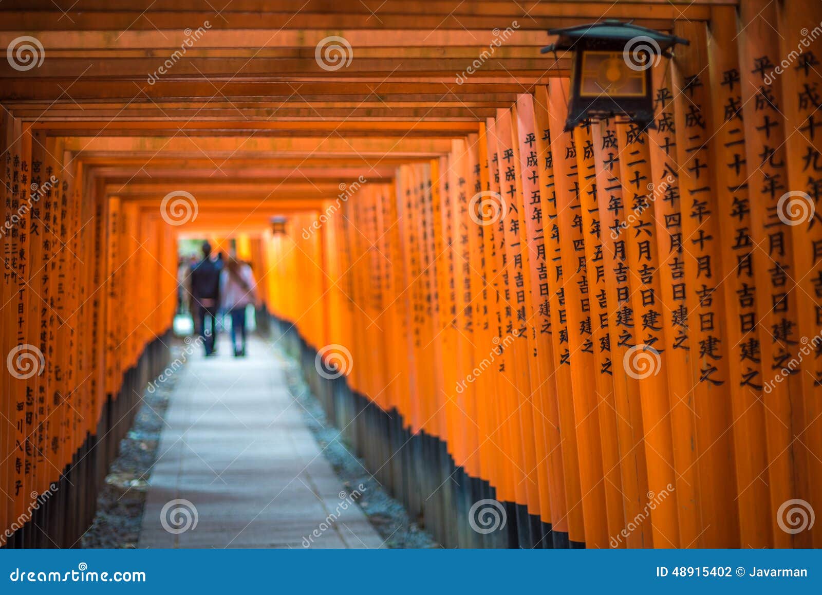red torii of fushimi inari shrine, kyoto, japan