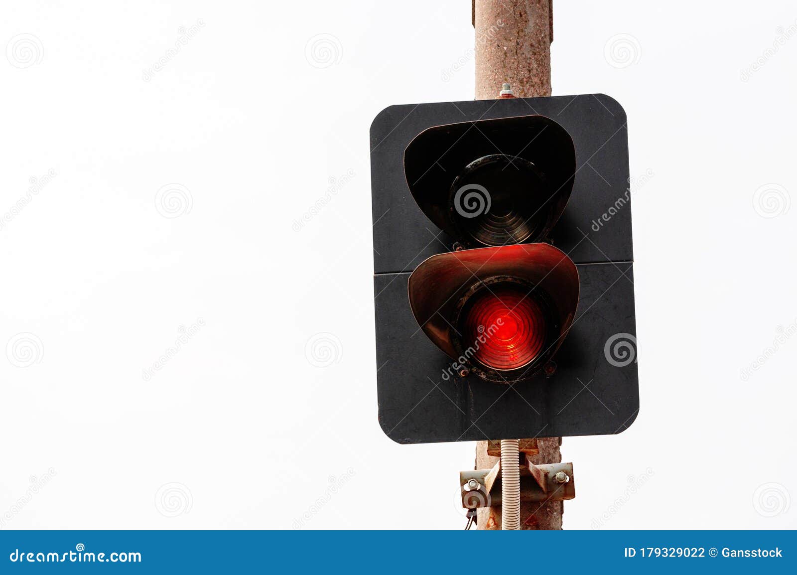 red traffic light regulates the movement on the railway