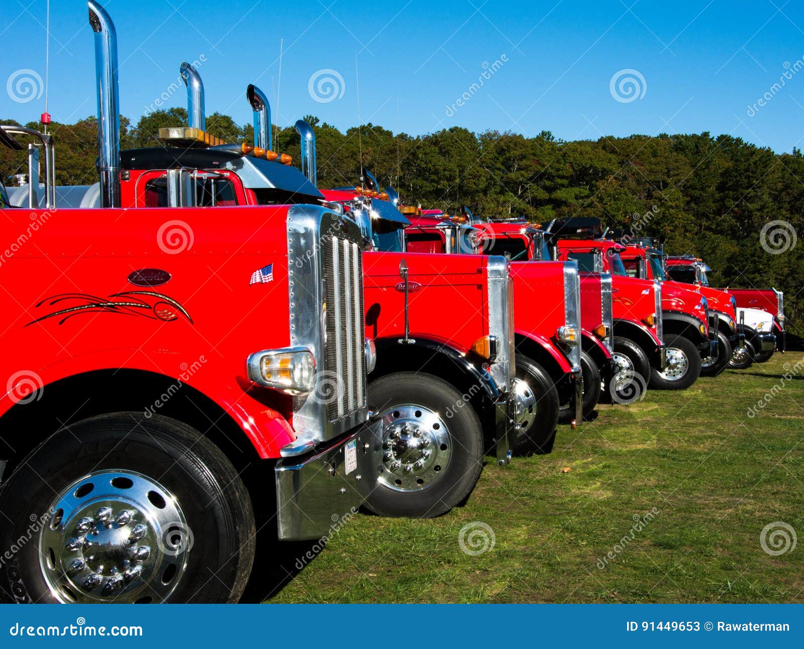 Red trucks parked in a row stock image. Image of shipping 91449653