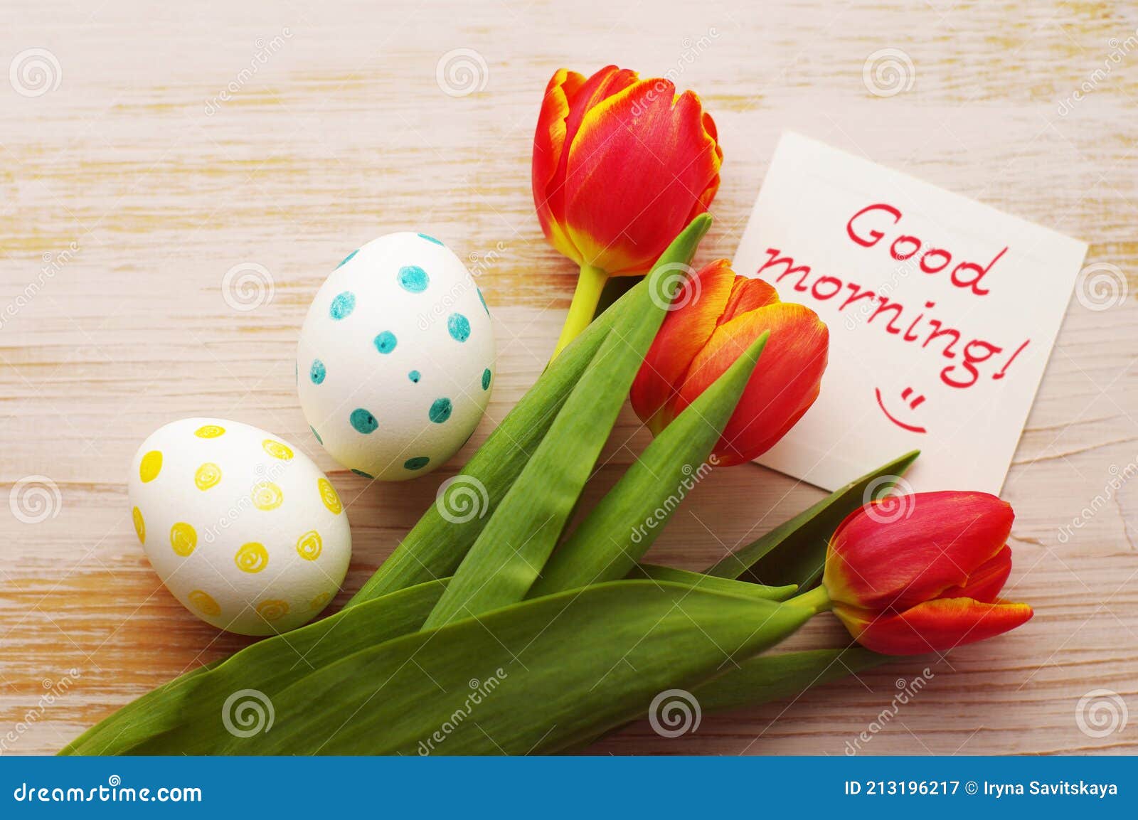 Red Tulips, Two Easter Eggs and Empty White Card with Text Good Morning