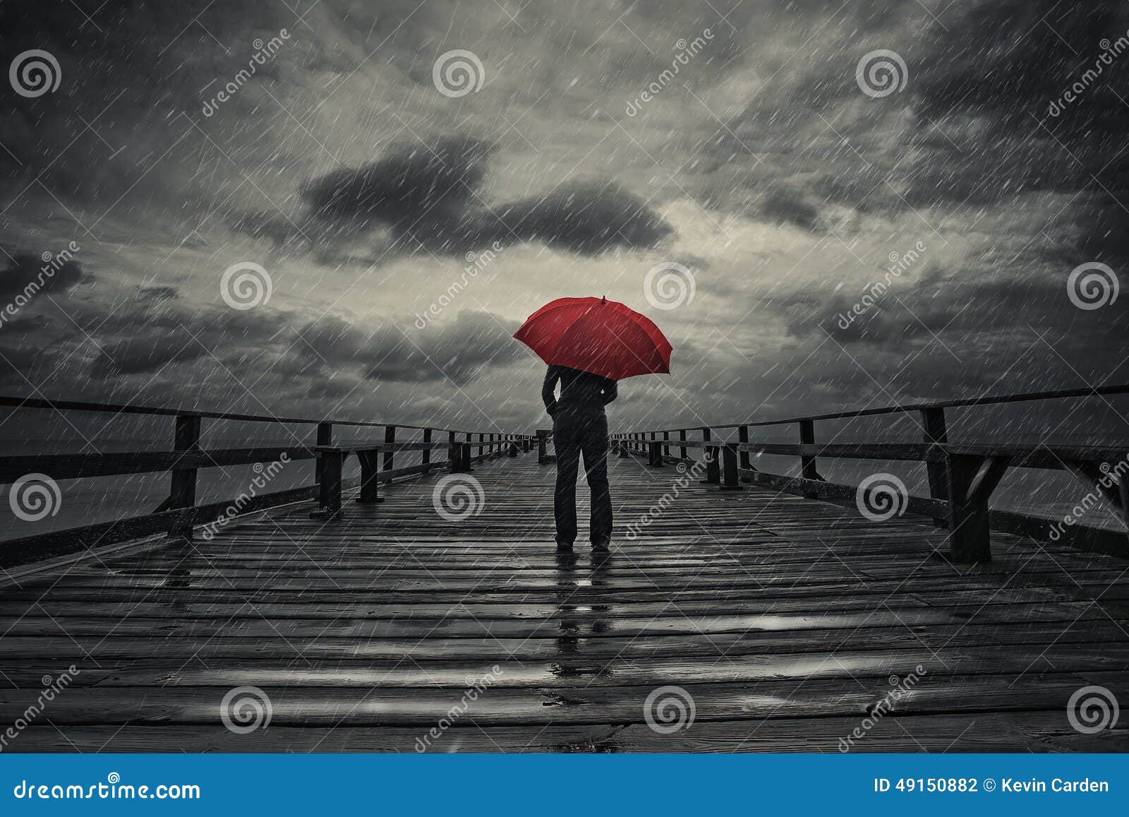 red umbrella in storm