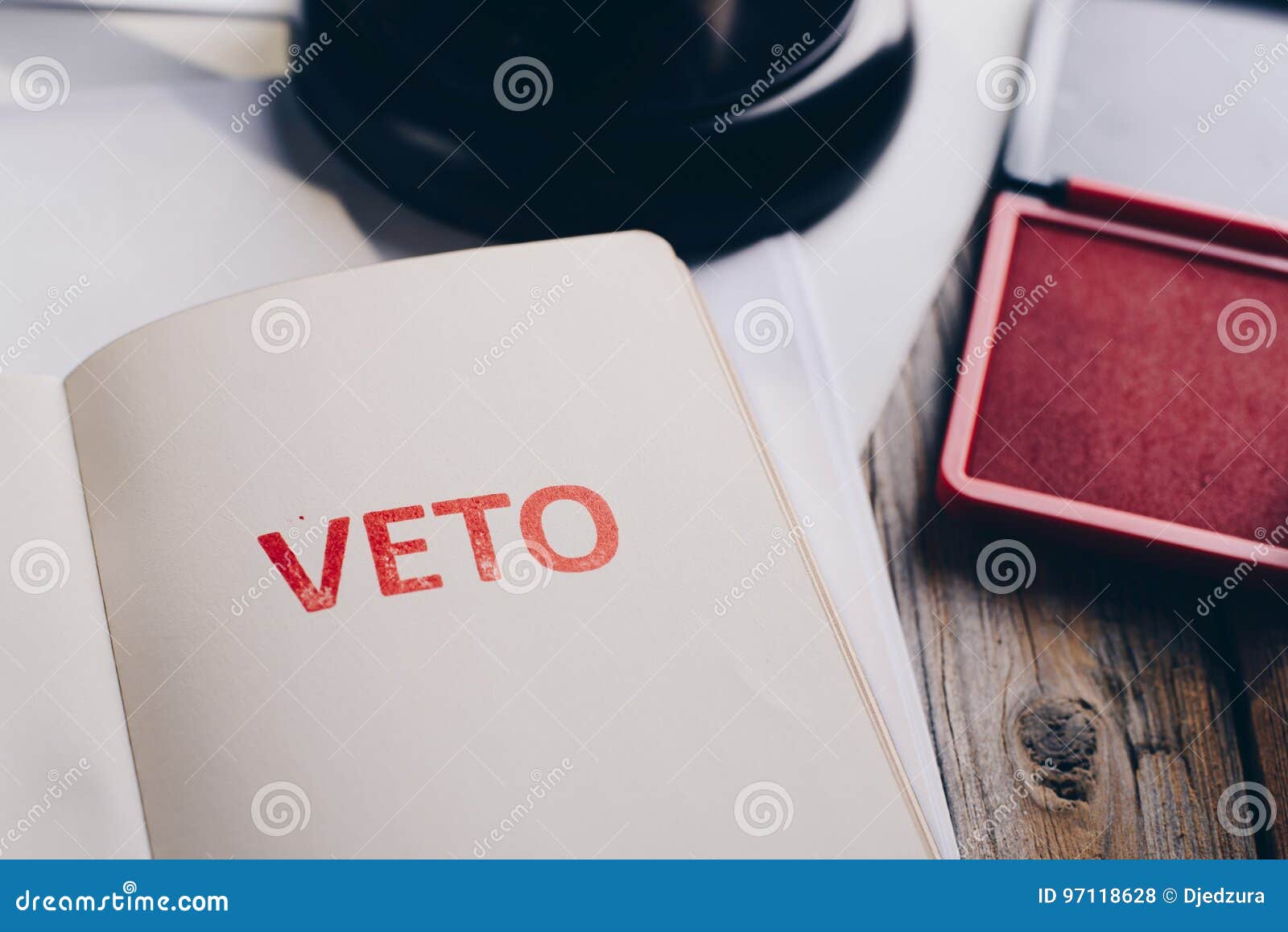 red veto stamp in notepad