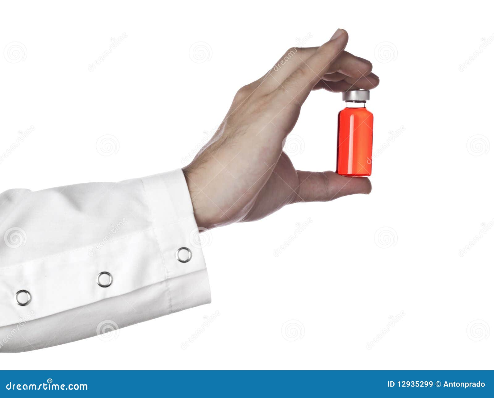 red vial on a hand