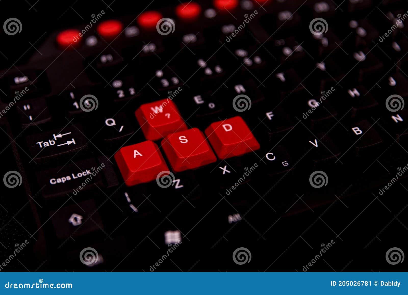 black keyboard with red wasd keys