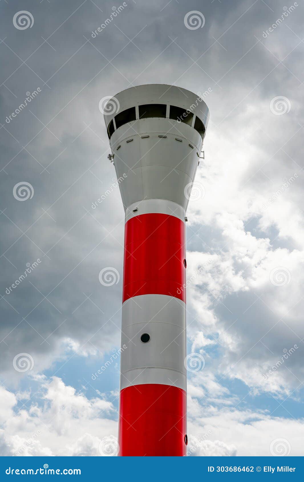 red and white blankenese lighthouse near hamburg. historic lighthouse on the elbe