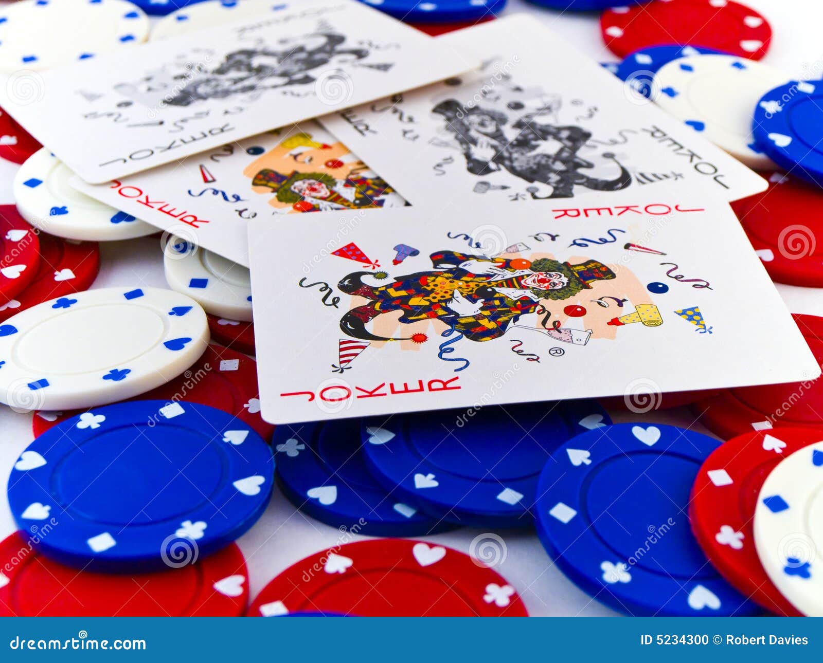 Red White and Blue Poker Chips and Jokers on White Stock Photo Image