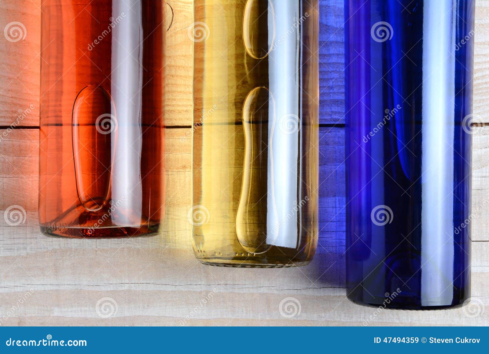 Red White Blue Wine Bottles Stock Image - Image of transparent, wood