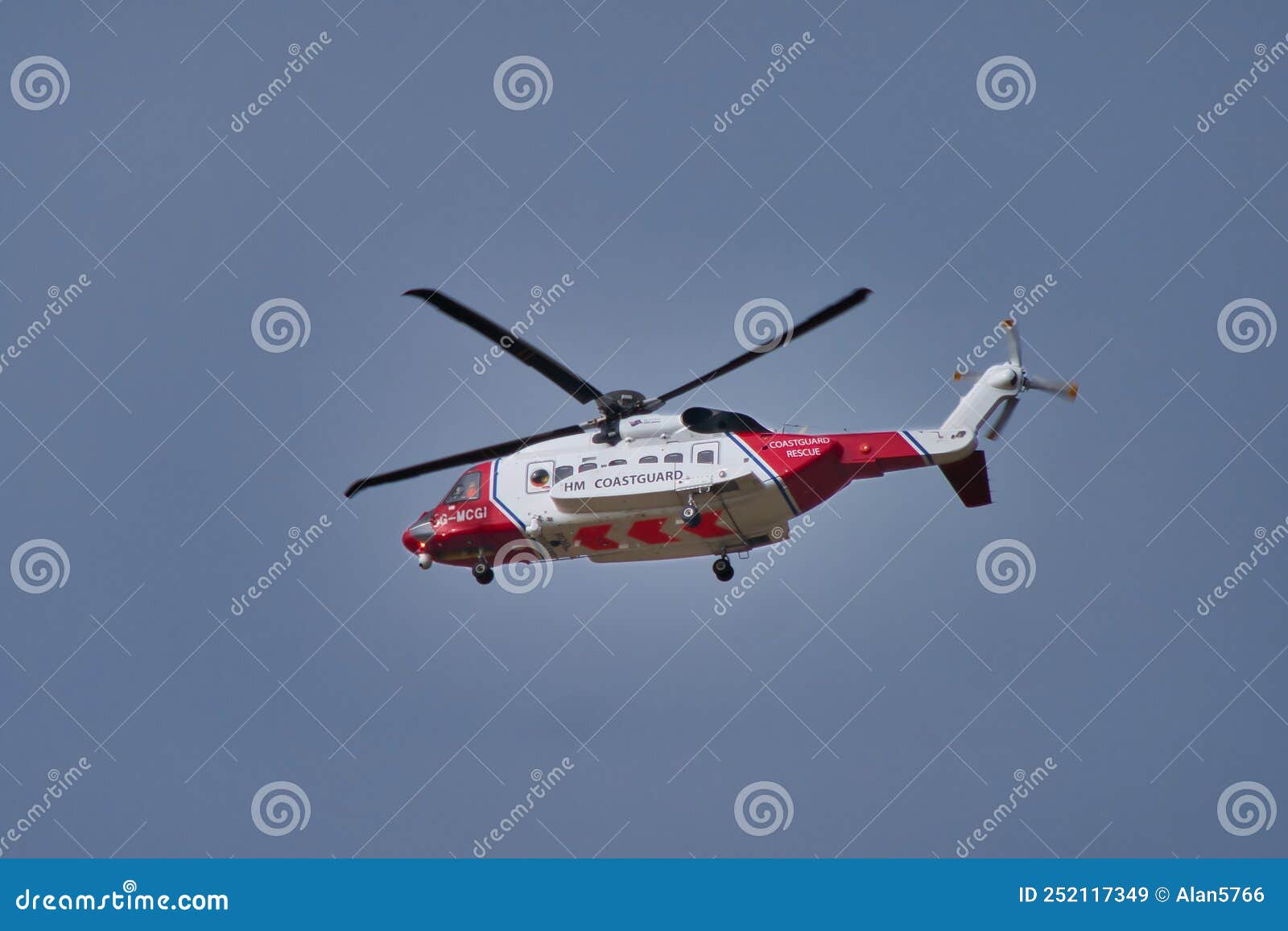 A Red and White HM Coastguard Sikorsky S92A Helicopter in Flight