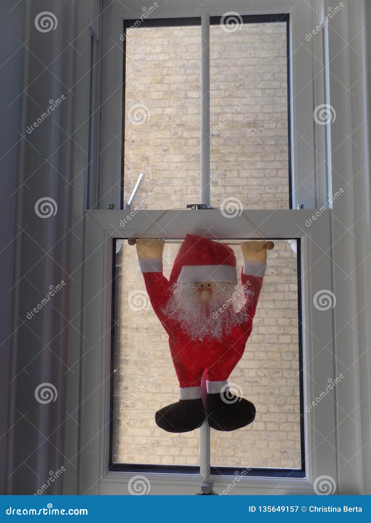 Santa Christmas Decoration Hanging from Window Stock Image - Image of ...