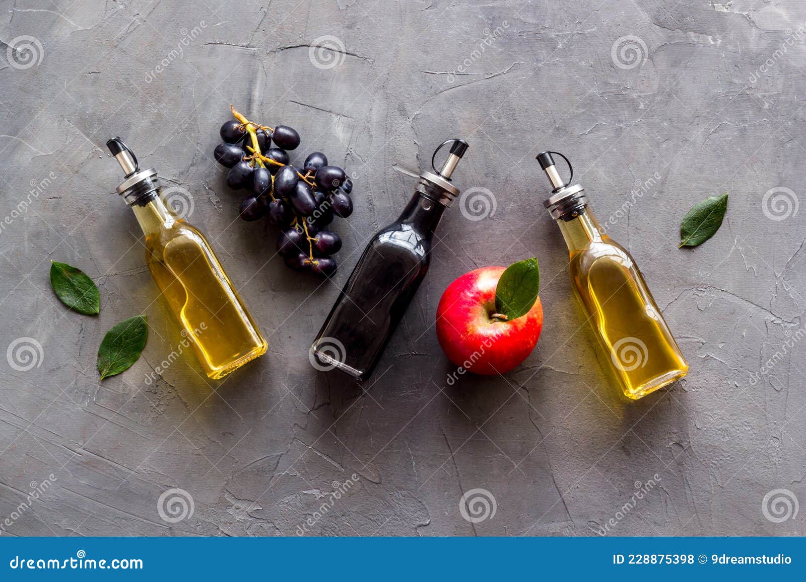 Red Wine and Apple Cider Vinegar with Grapes and Red Apples Stock Photo