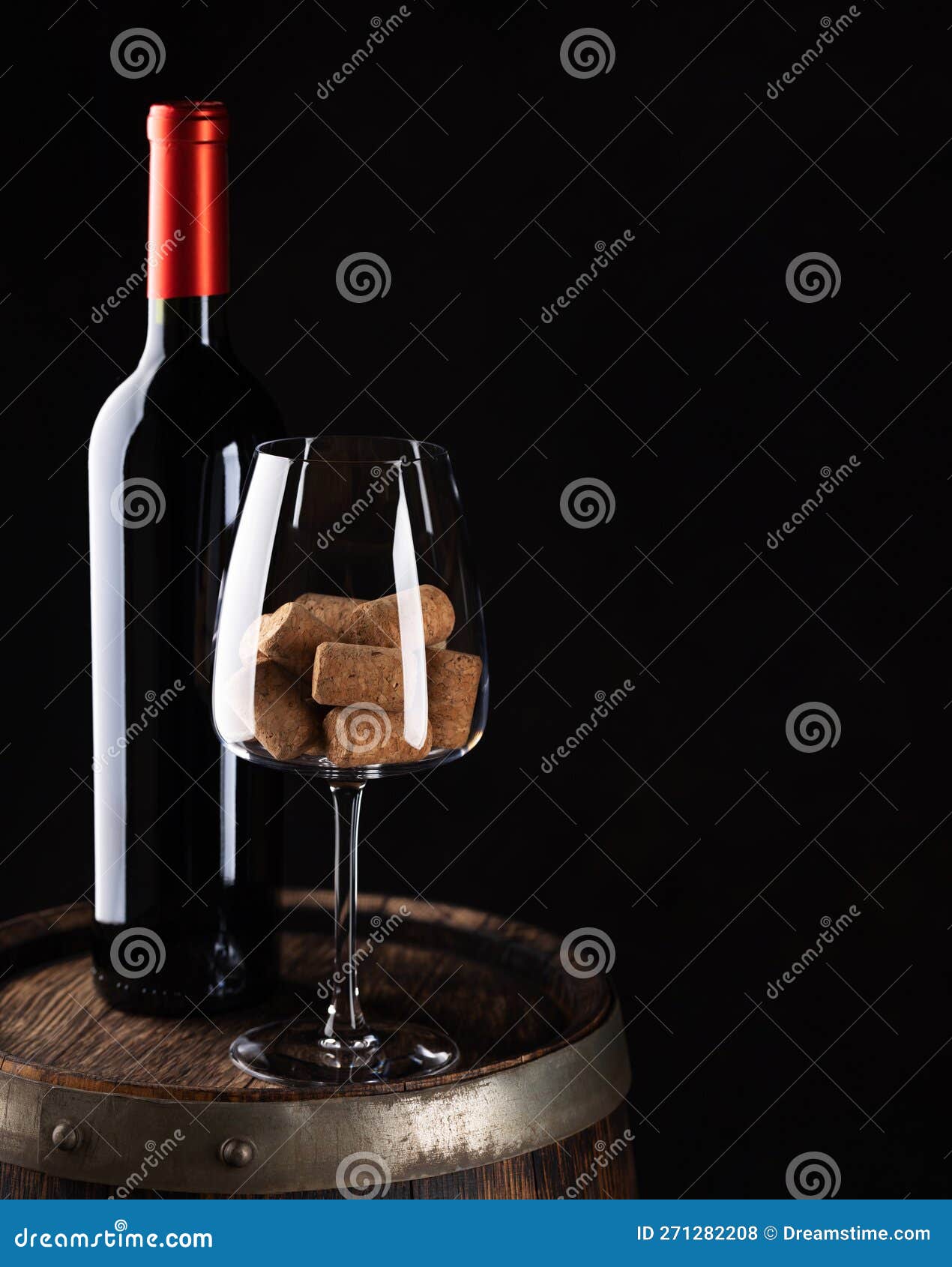 Red Wine Bottle, Barrel and Wine Glass with Corks Stock Photo Image