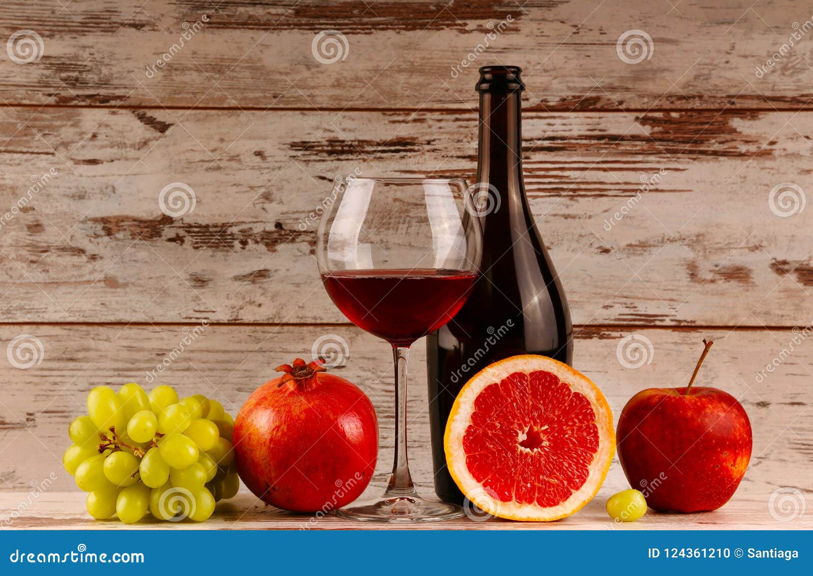 Top view pomegranate wine, bottle opener and fruit Stock Photo - Alamy