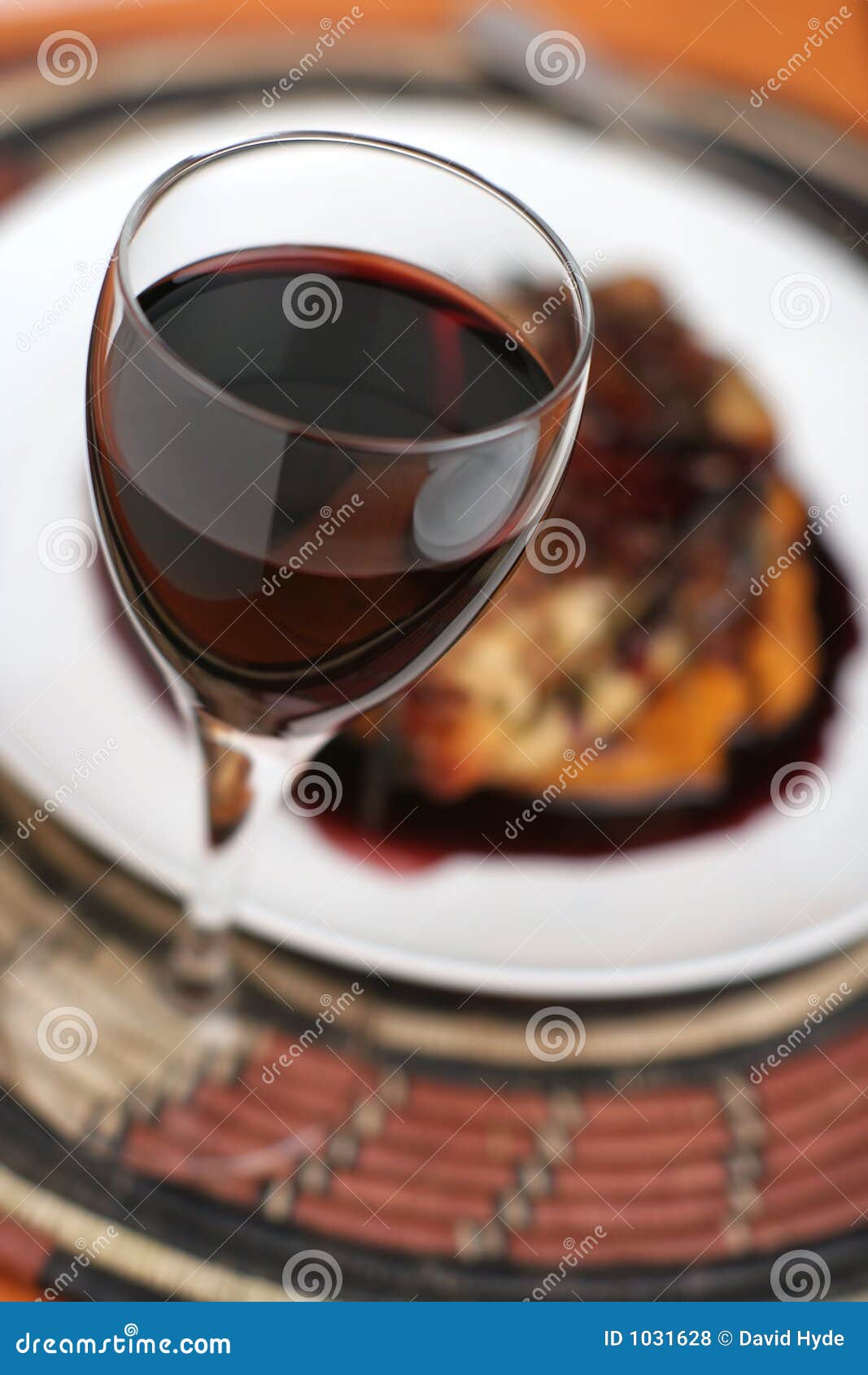 Red Wine Dinner; Glass Focused Tall View. Stock Photo Image of wine