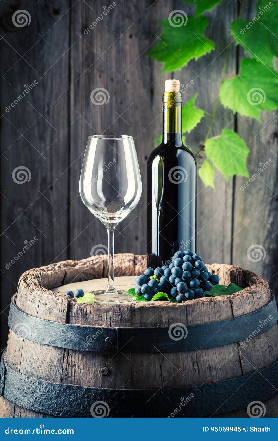 Red Wine, Empty Glass and Fresh Grapes on Old Barrel Stock Image ...