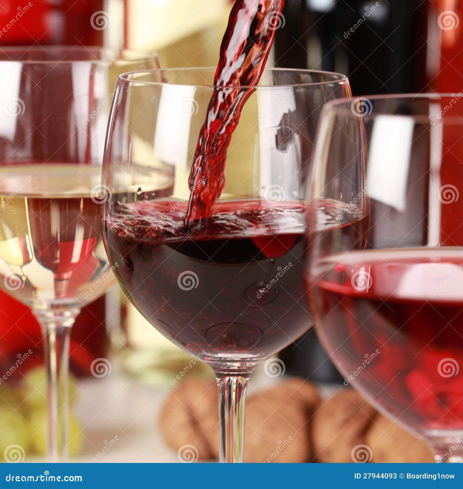 red wine pouring into a wine glass