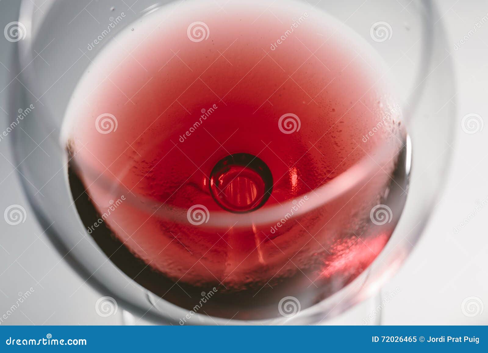 red wine on a wineglass close up