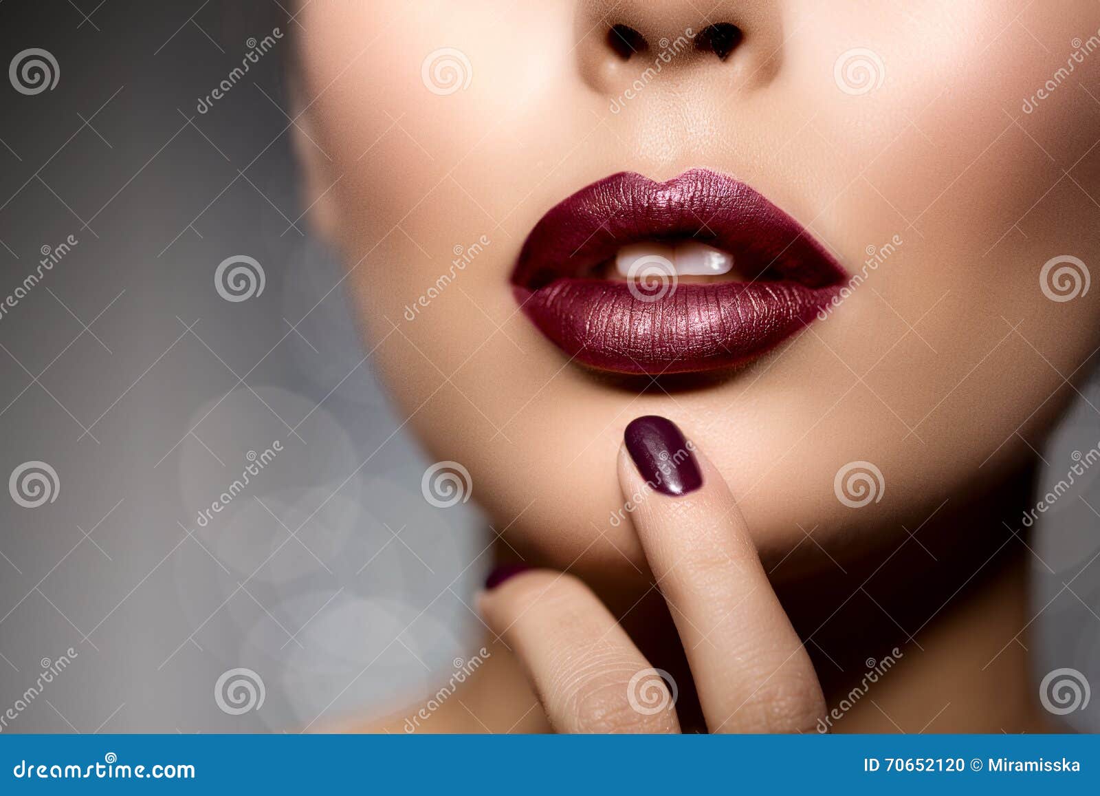 red woman lips close up. beautiful model girl with lipstick