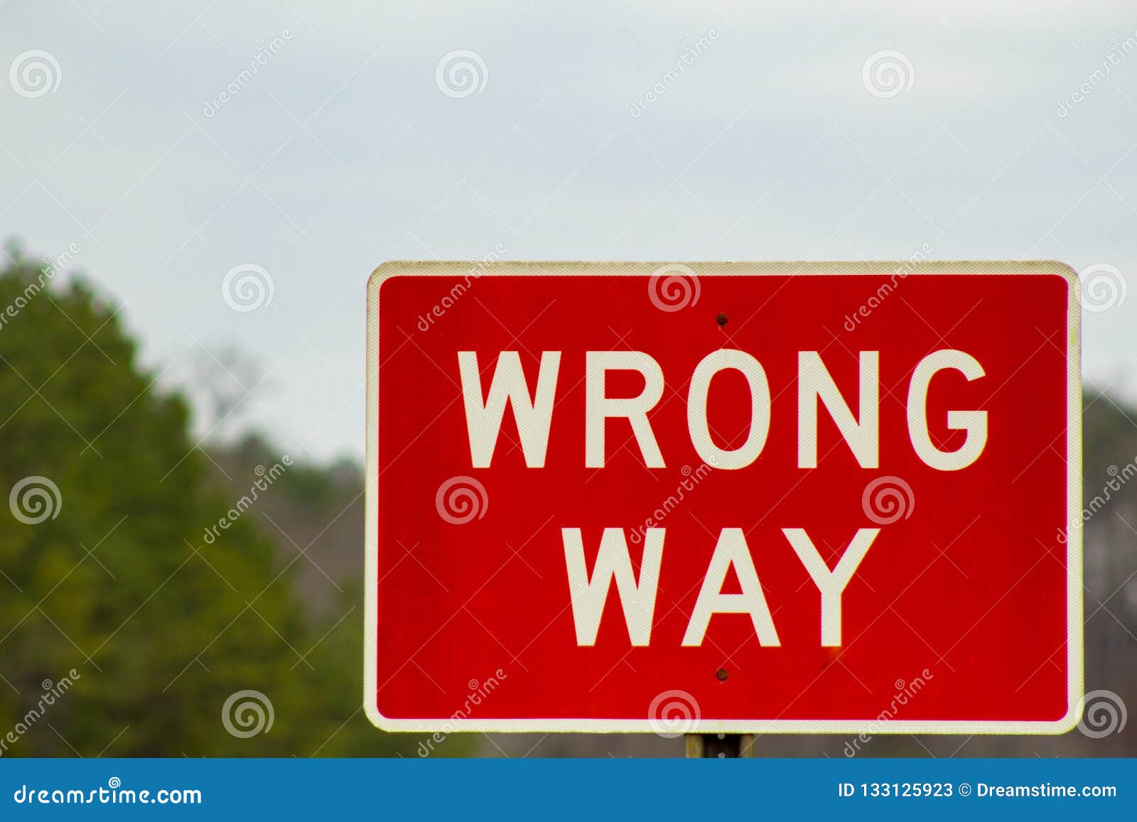 red wrong way sign on the road