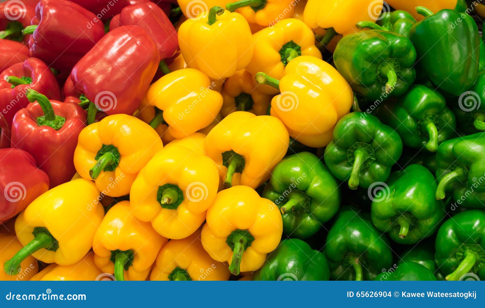 red, yellow, and green bell peppers (capsicum) background