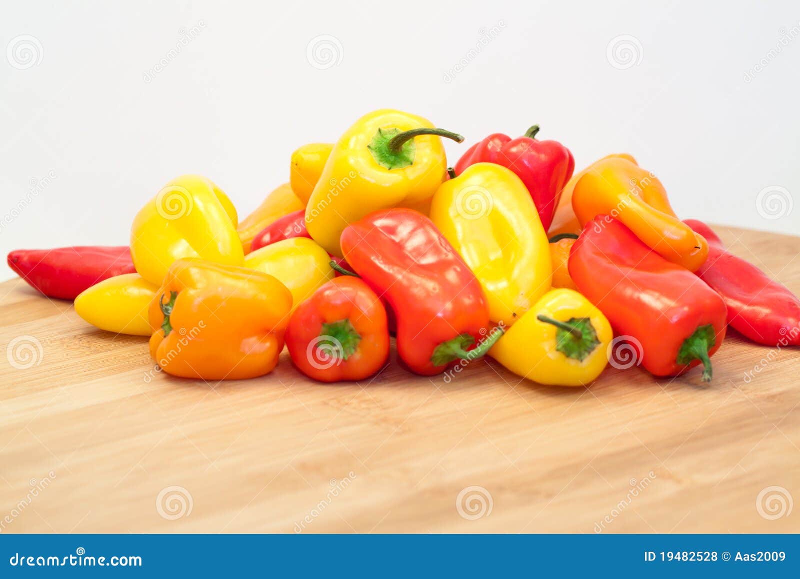 Red yellow orange peppers stock photo. Image of closeup 19482528