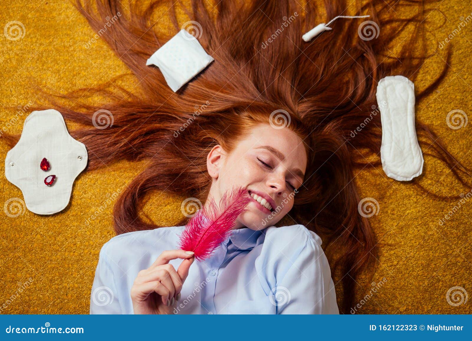 Redhaired Ginger Long Hair Woman Lying Down At Floor With Eco