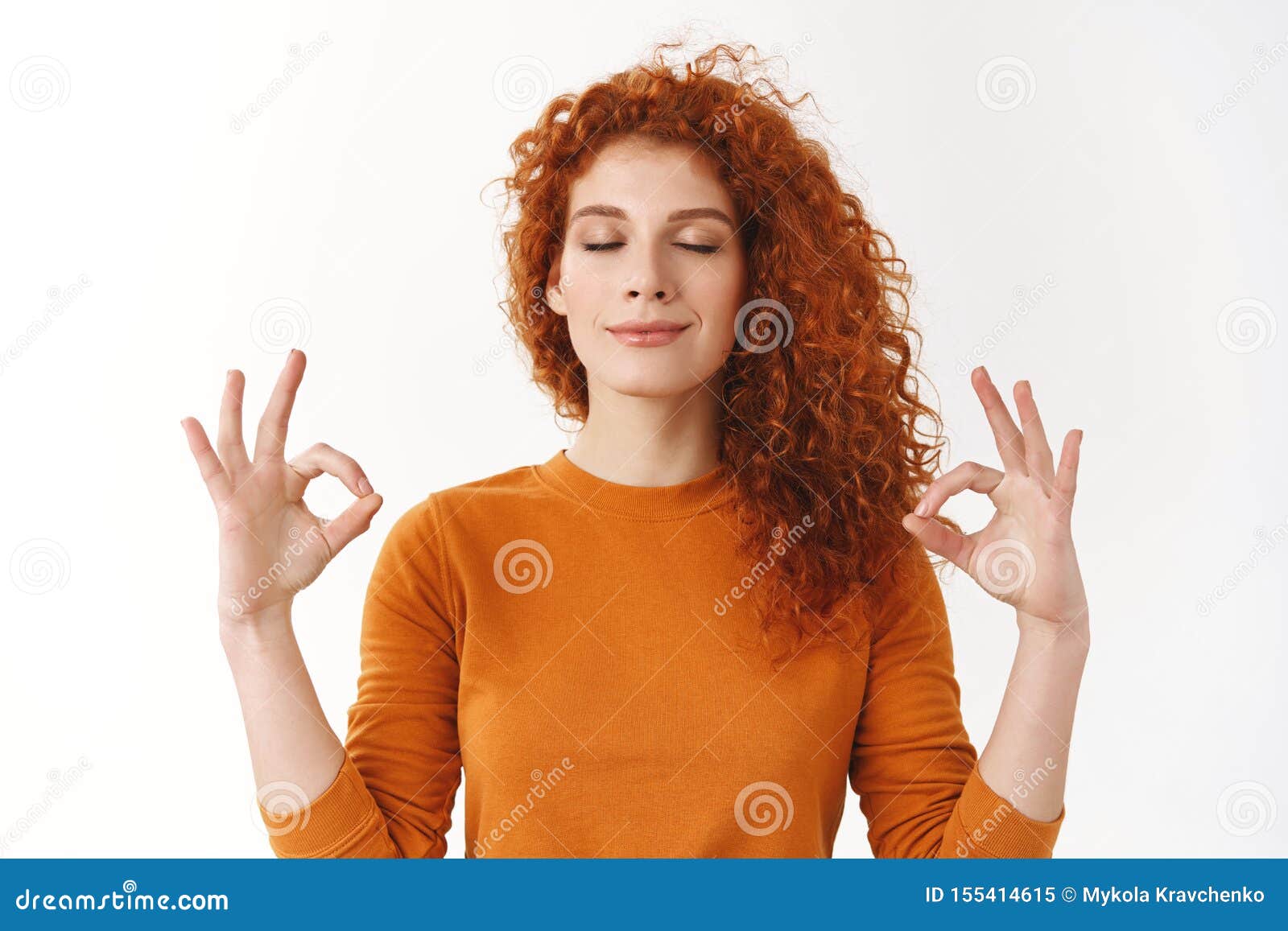 redhead girl calm down, soothing stress with yoga. relieved happy ginger woman peacefully meditating, making zen mudra