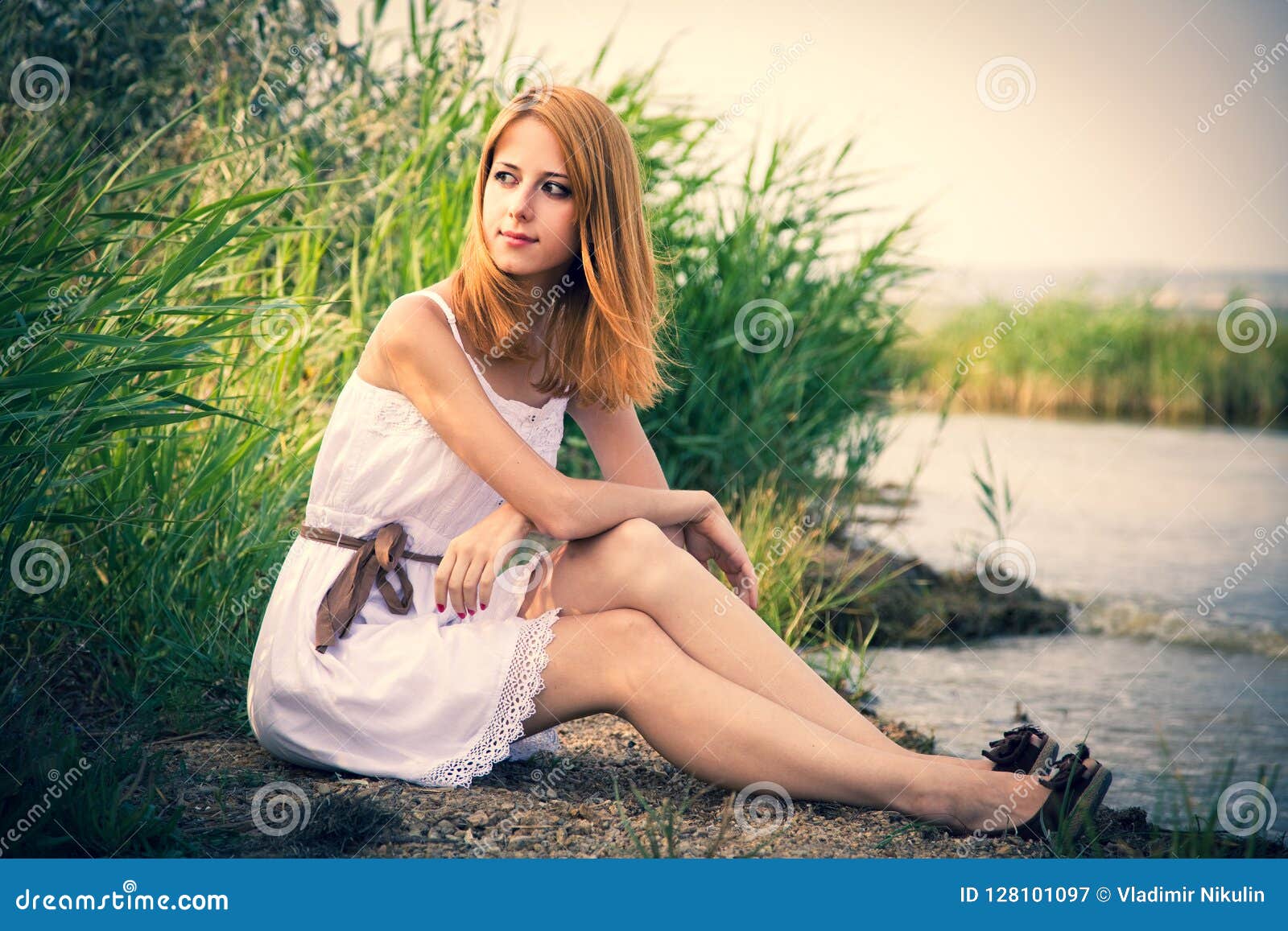 Redhead Girl Sitting Near River Stock Image - Image of people, river ...