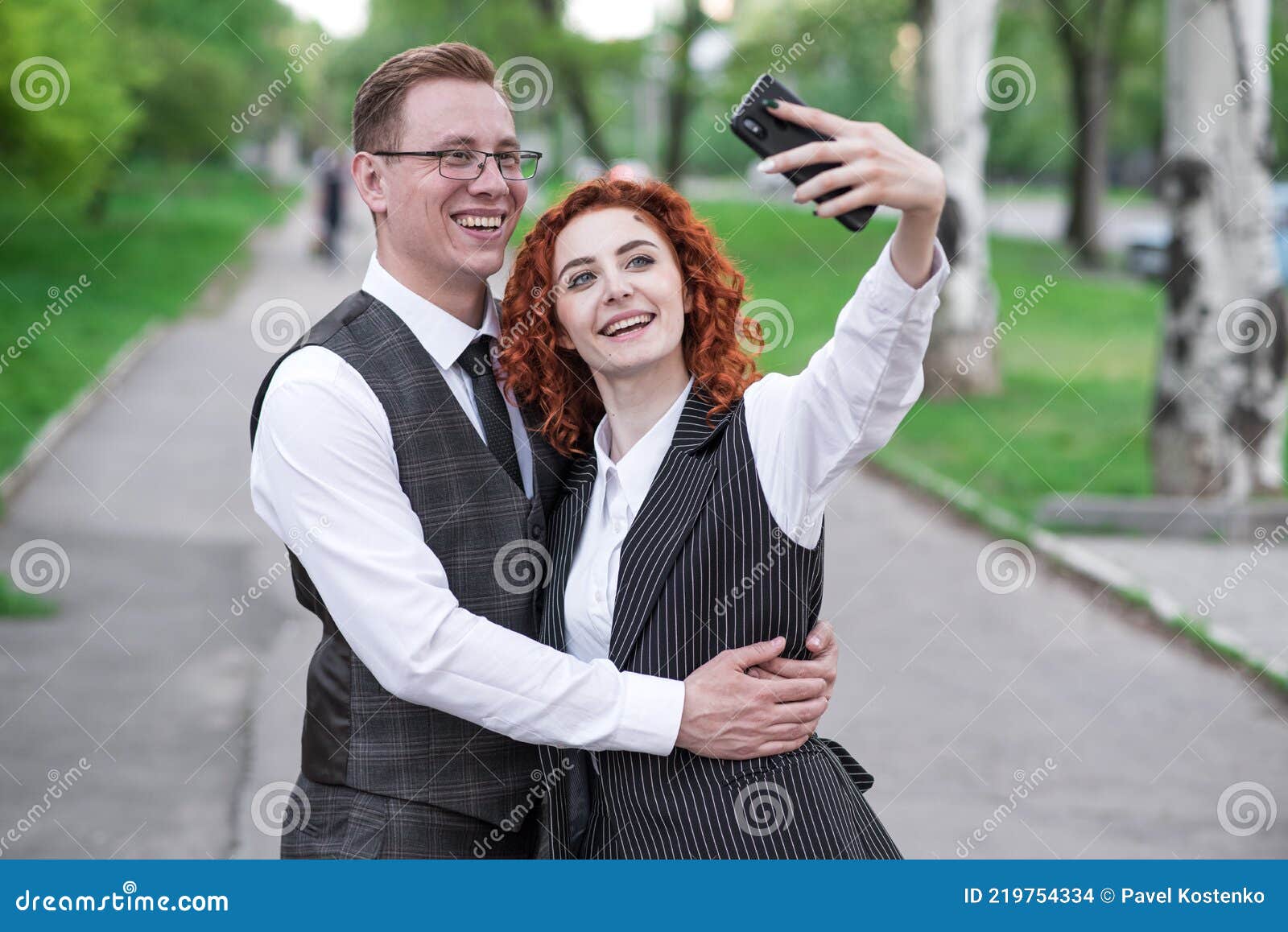 The Redhead Husband Hugs His Redhead Wife Wife Takes Selfie On 